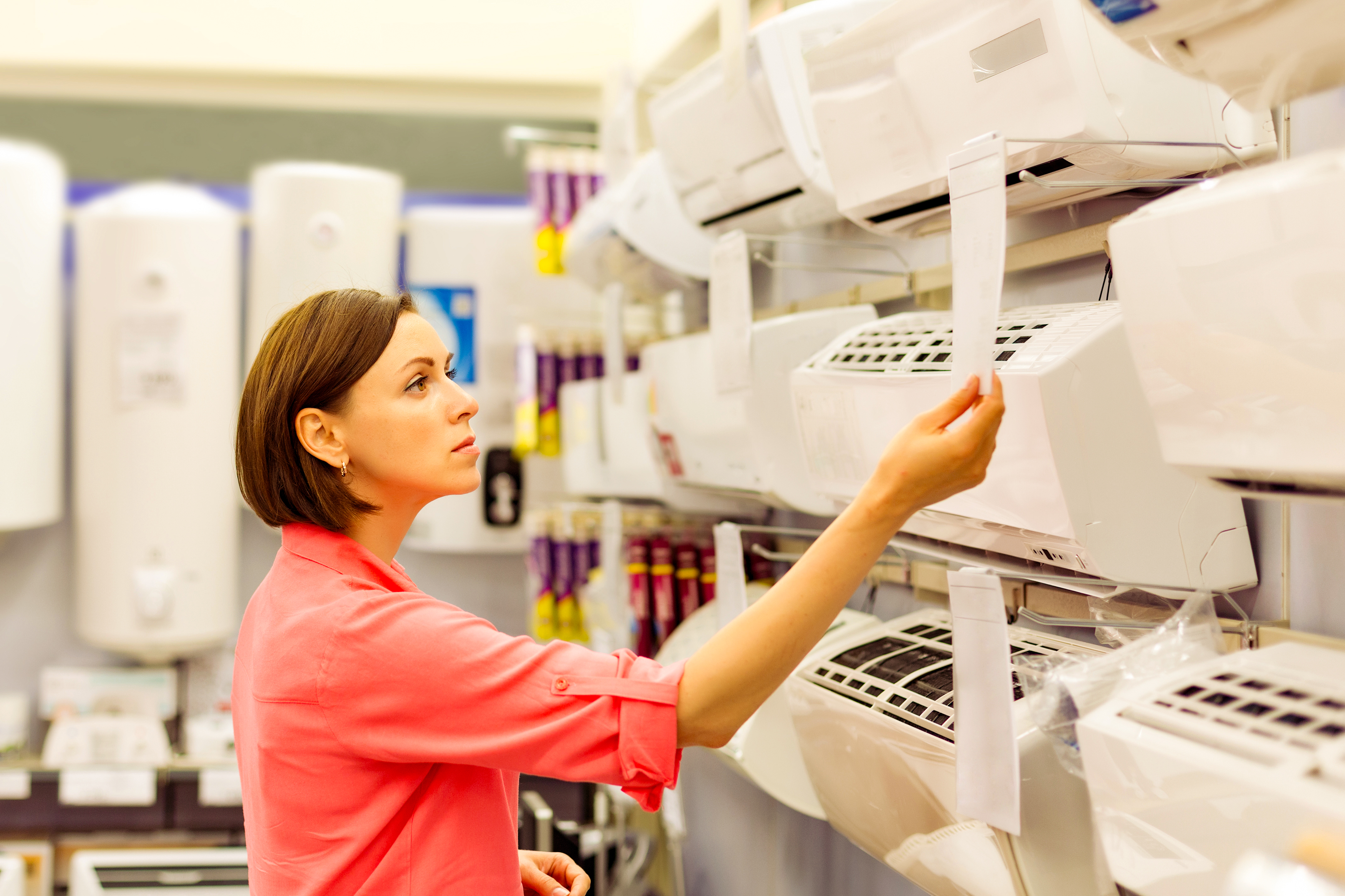 Retail executive checking late payments and payment practices reporting for consumer durables inventory